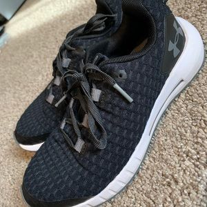 Boys UA tennis shoes.